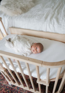 Baby safely co-sleeping in a bedside bassinet | babybay bedside co-sleepers