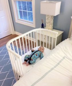 A newborn safely co-sleeping in bedside sleeper | babybay cosleeping crib