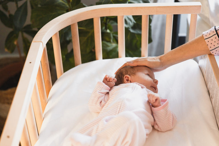 This Is the Secret Behind How to Transition from CoSleeping to Crib
