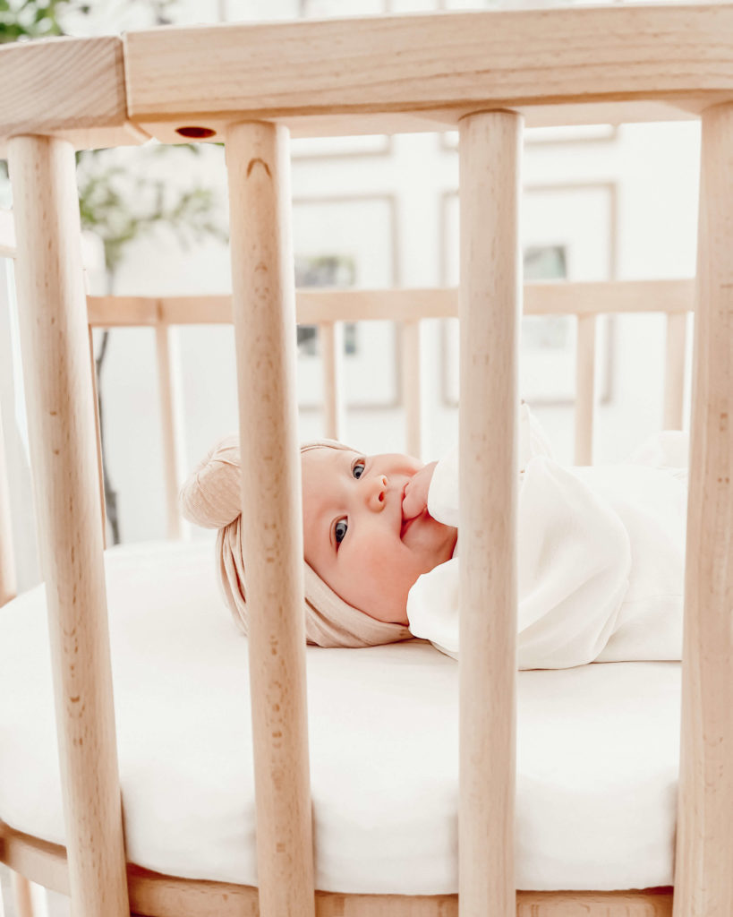 baby in babybay co sleeper bedside crib