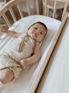 Baby enjoying the benefits of co-sleeping | babybay Bedside Co-Sleepers